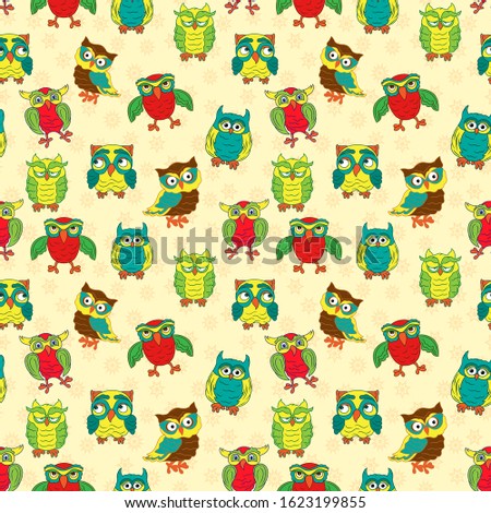 Seamless texture with colorful cartoon funny owls for children decoration on the beige pattern background 