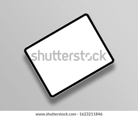 Modern tablet with blank white screen. Mockup scene. Top view. Photo mockup with clipping path.