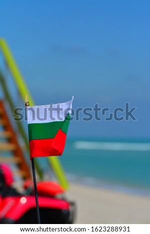 Beautiful National Flag of Bulgaria on Tropical Beach