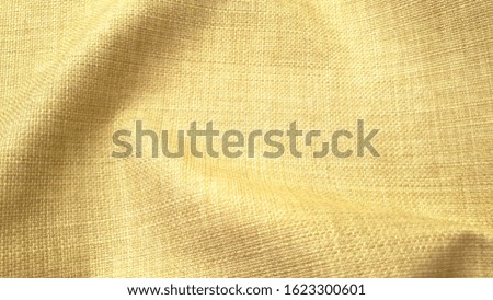 fresh bright yellow fabric texture. happiness background with space for text (select focus on center of picture)