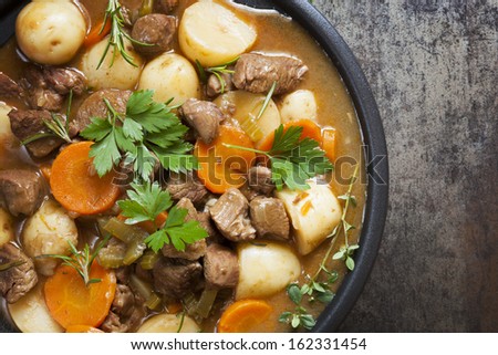 Irish stew, made with lamb, stout, potatoes, carrots and herbs. Royalty-Free Stock Photo #162331454