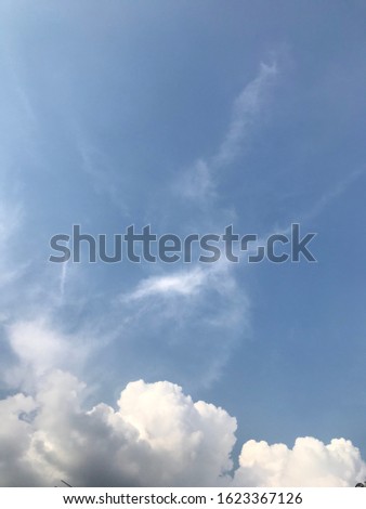 White Cloudy in sky blue