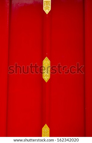 Red the door make with wood at Wat Pho temple in Bangkok,Thailand 