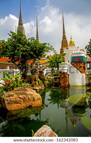 Sharp architecture side the pool at Wat Pho temple in Bangkok,Thailand 