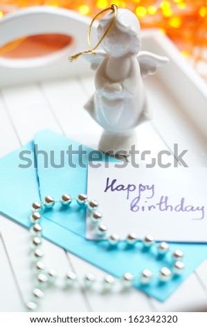 Envelop and note with Happy birthday greeting