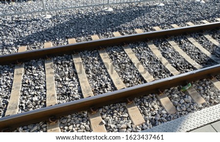 Autumn view of the outgoing railway. Railway or railroad tracks for train transportation.