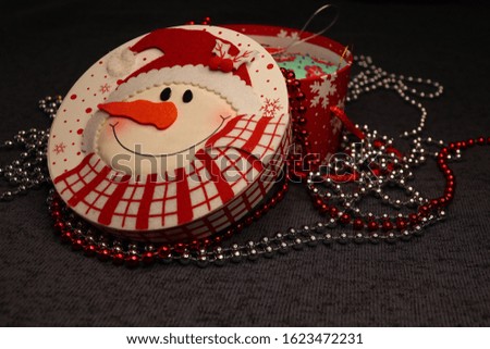 Christmas box with felt decoration. Snowman with felt.