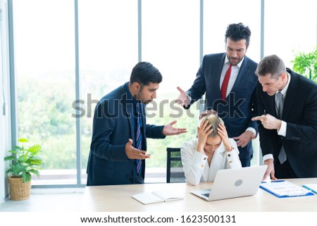 Male colleagues pointing fingers at upset female boss on meeting, tired sad woman leader experiencing gender discrimination at work, businessmen blaming bullying depressed businesswoman for mistake Royalty-Free Stock Photo #1623500131