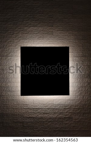 Black sign and Lighting design on modern brick wall