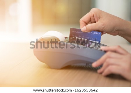 Swipe the blue credit by hand on the payment screen.