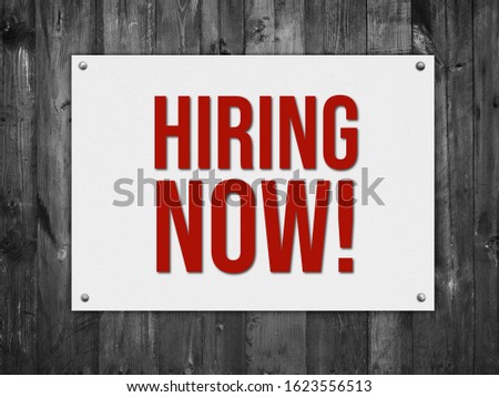 Hiring sign notice on wood texture background