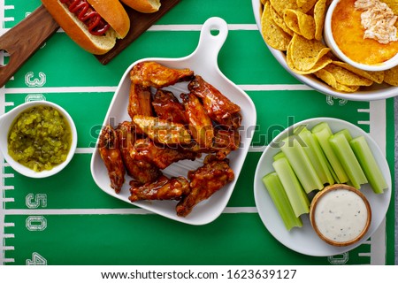 Hot wings glazed with honey, air fried or roasted, game day food Royalty-Free Stock Photo #1623639127