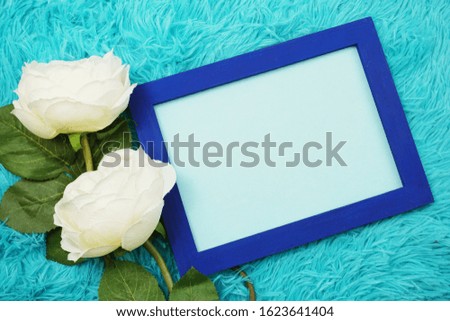 Flat lay Mock-up space Photo Frame with peony flower decoration