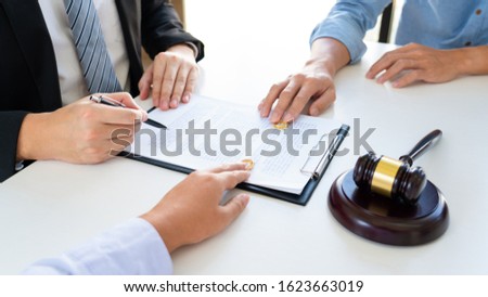 Couple husband and wife during divorce process listening to lawyer dissolves marriage contract, Dissolution of marriage concept