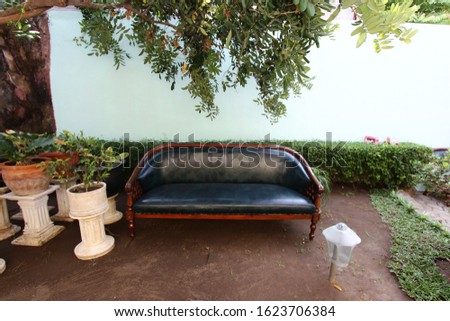 long sofa in the home garden, exterior design ideas with the concept of sitting relaxed