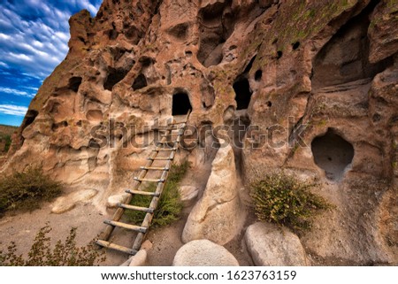 Cliff Dwellings  in Bandelier National Monument. Royalty-Free Stock Photo #1623763159