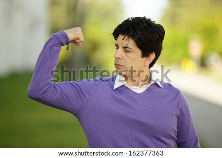 Stock image of a man flexing his muscles