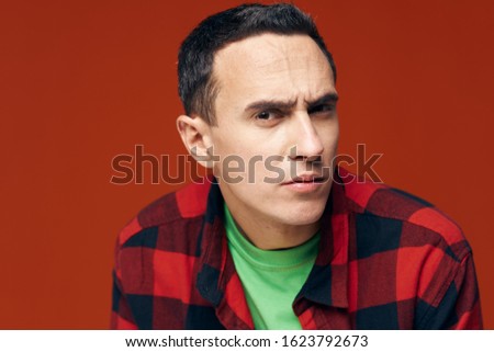 Attractive gentleman close up portrait and checkered shirt
