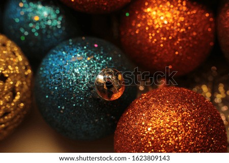 shiny bright background ball and garland as beads for decorating the Christmas tree festive macro objects