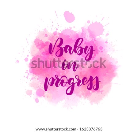 Baby in progress -  inspirational handwritten modern calligraphy lettering on watercolor painted splash. Gender reveal. Pink colored - for baby girl.