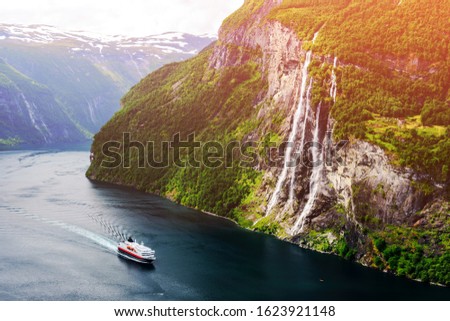 Breathtaking view of Sunnylvsfjorden fjord and famous Seven Sisters waterfalls, near Geiranger village in western Norway. Landscape photography