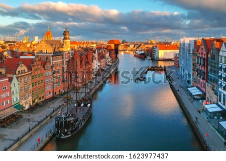 Aerial scenery of the old town in Gdansk over Motlawa river at sunrise, Poland.