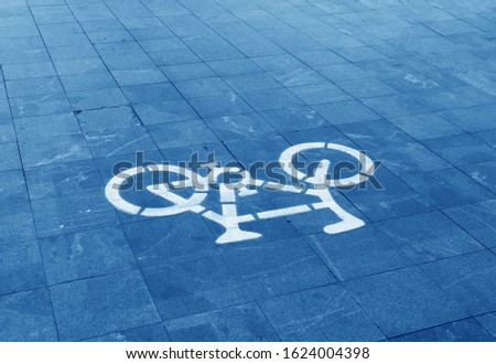 the symbol of a bicycle lane on the road