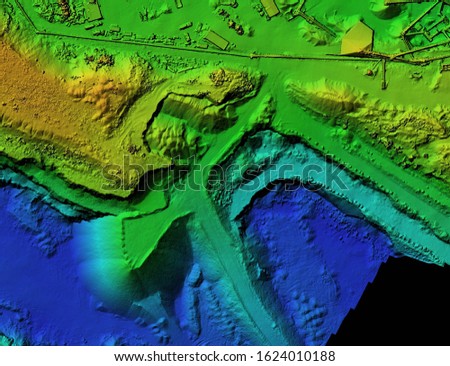 DEM - digital elevation model. GIS product made after proccesing aerial pictures taken from a drone. It shows mine with stockpiles that can be measures due to mapping Royalty-Free Stock Photo #1624010188