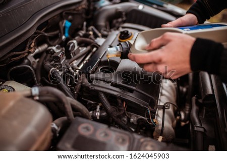 Change the oil, close the selective focus. fluid replacement in the car. equipment maintenance