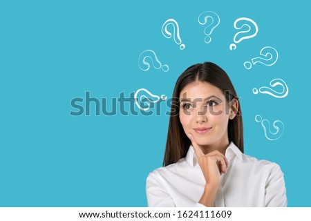 Thinking smile woman with questions marks on pastel background