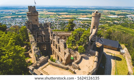 Aerial Sunny Drone Photo Of The Castle in Germany. The fortress is on the hill, there is a perfect view on the small city near Frankfurt, Germany.