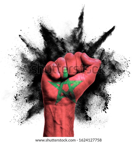 Morocco raised fist with powder explosion, power, protest concept