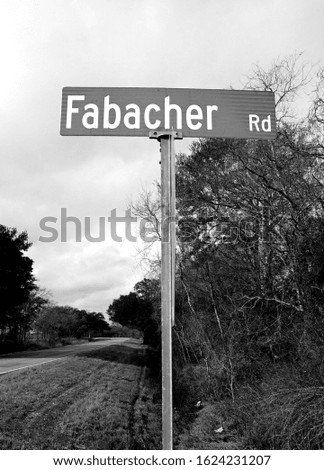 Fabacher road street sign in black and white