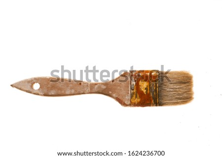 wooden paint brush used over white                        