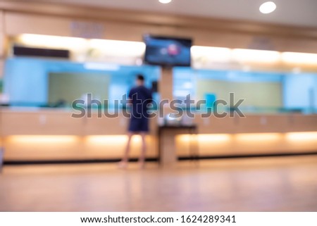 Blurry photo cashier counter in hospital.
