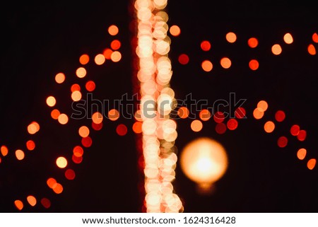 Blurry illuminated glowing lights at night