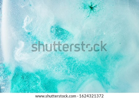 Green blue abstract exoplanet outer space vibrant sea. Waves, splashes and drops of water paint. Mysterious esoteric depths of the galactic ocean