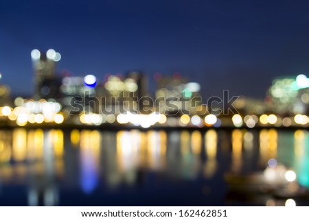 Portland Oregon Downtown Along Willamette River at Blue Hour with Out of Focus City Lights