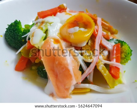 Easy breakfast homemade salad with soft-boiled egg. Royalty-Free Stock Photo #1624647094