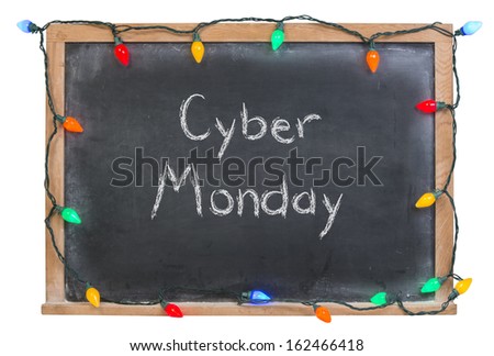 Cyber Monday written in white chalk on a black chalkboard surrounded by festive colorful lights isolated on white