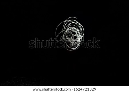 light of long exposure with black background