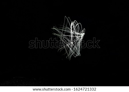 light of long exposure with black background