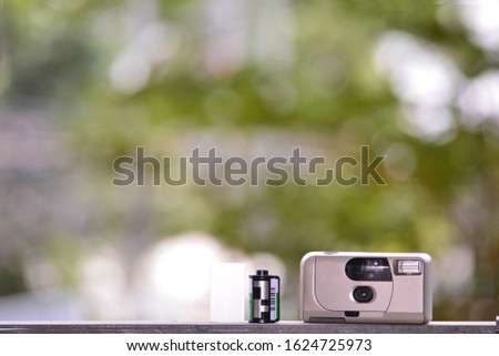 film camera with green background