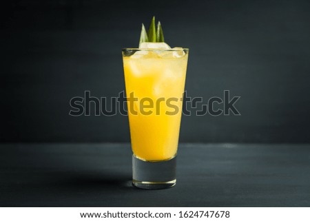 Pineapple cocktail in highball glass. Selective focus. Shallow depth of field.