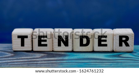 concept word tender on cubes on a beautiful background