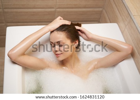 Charm woman clean skin white foam bathroom