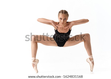 Dance exercise ballerina pointe shoes black swimsuit squats