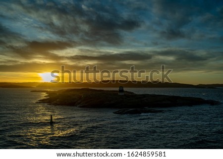 Sunset at the beach in Norway with beautiful clouds