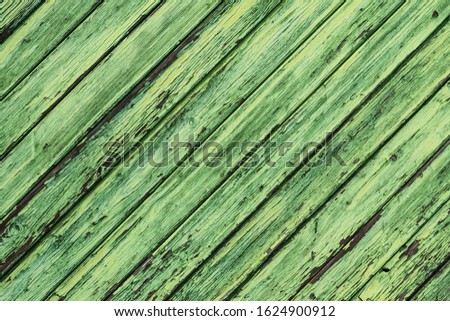 Green Colored old wooden boards background. Placed diagonally.