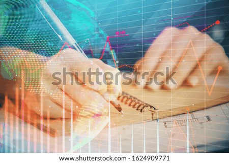 Forex chart displayed on woman's hand taking notes background. Concept of research. Double exposure